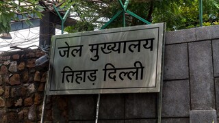 Sign board showing Tihar Prison Complex at Janakpuri in New Delhi. Copyright (c) 2019 mrinalpal/Shutterstock.