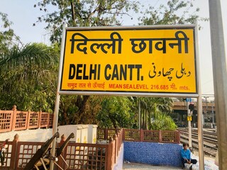 Delhi Cantt Sign Board at Station in Hindi Language in Delhi, India. Copyright (c) 2023 kk1hb/Shutterstock.