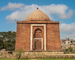 Lal Gumbad, one of the finest monuments of the pre-Mughal city in Delhi, India. Copyright (c) 2020 Kevin Standage/Shutterstock.