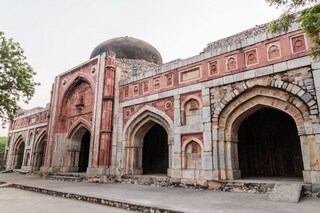 Jamali Kamali Mosque and Tomb, located in the Archaeological Village complex in Mehrauli, Delhi, India. Copyright (c) 2017 Matyas Rehak/Shutterstock.