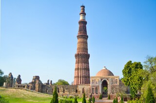 Qutub Minar, the tallest minaret, a UNESCO World Heritage Site in the Mehrauli area of New Delhi, India. Copyright (c) 2021 artluv soul/Shutterstock.