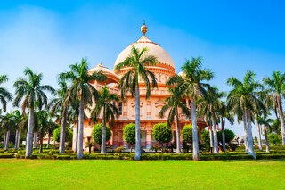 Baba Nagpal Temple at Chhatarpur Temple complex or Shri Aadya Katyayani Shakti Peetham in Delhi city in India. Copyright (c) 2022 saiko3p/Shutterstock.