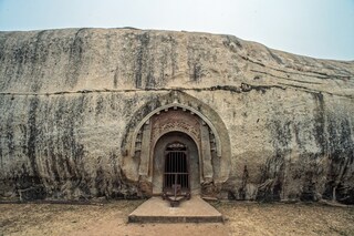 Entrance of Barabar Caves, oldest man made caves built by cutting these granite hills in Bihar by Mauryan Empire of Magadh Jahanabad in Bihar. Copyright (c) 2023 AnilD/Shutterstock.