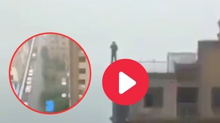 व्यक्तीनं अचानक उंच इमारतीवरून उडी मारली