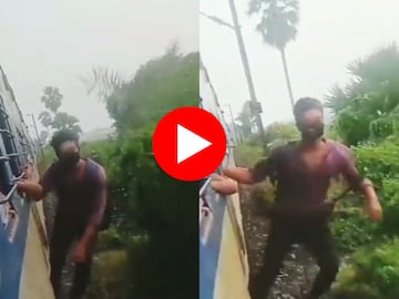 तरुणाचा ट्रेनला लटकून स्टंट