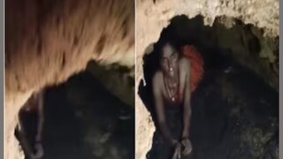 गुहेतून बाहेर आली महिला 