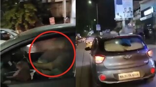 कारमध्येच जोडप्याचे अश्लील चाळे