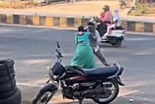 Video Viral: भररस्त्यात नवऱ्याची धुलाई! बायकोनं दिला WWE स्टाईल 'फिनिशिंग मूव्ह'