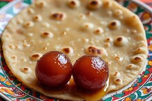 Gulab Jamun : चपातीपासून बनवा रसाळ गुलाबजाम, कमी खर्चात भारी मिठाई; खाऊन पाहुणे म्हणतील Wow