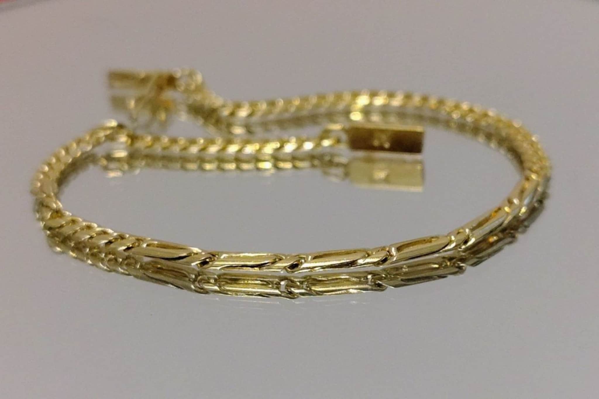 मेकिंग चार्जेस शिवाय किती रुपयांमध्ये बनेल 18 कॅरेट सोन्याची चेन? किती GST लागेल