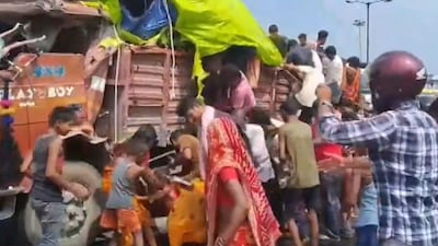 Liquor-laden truck overturns in dry Bihar; women, children loot boxes before police arrive