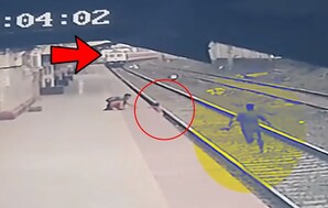 news18 - ଅନ୍ଧୁଣୀ ମା’ ସାମନାରେ କୁନି ପୁଅ ରେଳ ଲାଇନକୁ ଖସିଲା; ଟ୍ରେନ୍ ଆଗରୁ ବଞ୍ଚିଗଲା - VIDEO