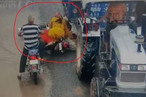Viral Video: ମଥା ଉପରେ ଚଢ଼ିଗଲା ଟ୍ରାକ୍ଟର୍ର ଚକ; ହେଲମେଟ୍ ପିନ୍ଧିଥିଲା ବୋଲି ବଞ୍ଚିଗଲା ଲୋକଟି