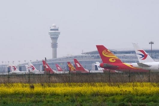 Aircrafts of China Eastern Airlines Shanghai Airlines and Hong Kong Airlines are seen on the tarmac at the Pudong International Airport following the novel coronavirus disease outbreak in Shanghai China
