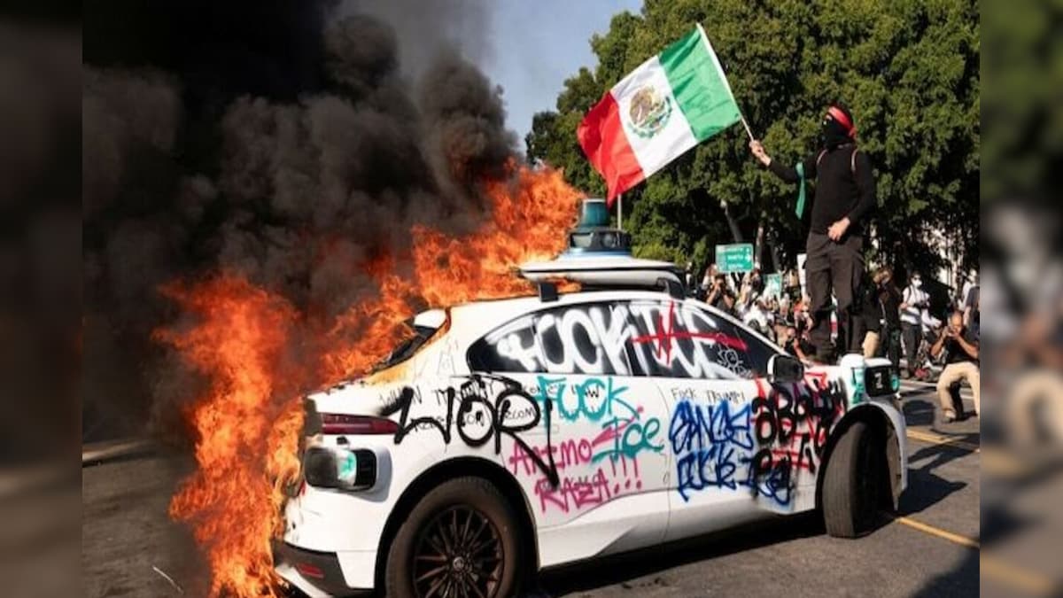 A riot, burnt American flag waved on the Los Angeles in the United States