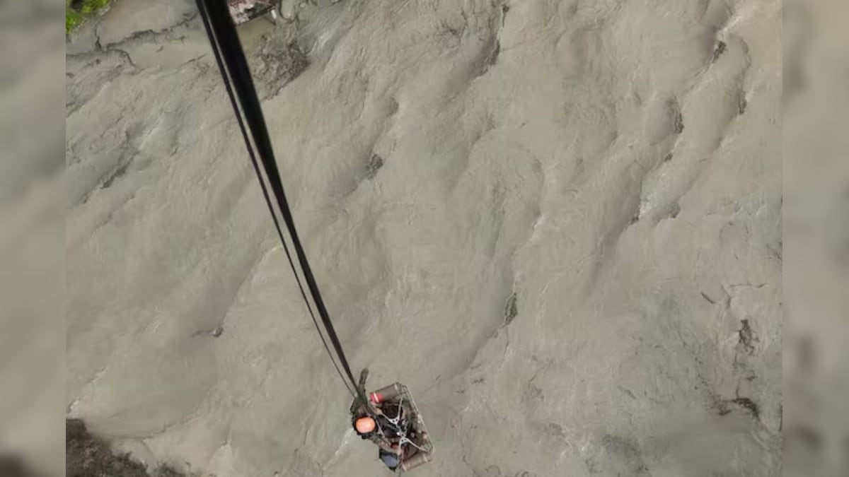 The Mitiri Bridge of Blurred as a straw in Nepal, flooded