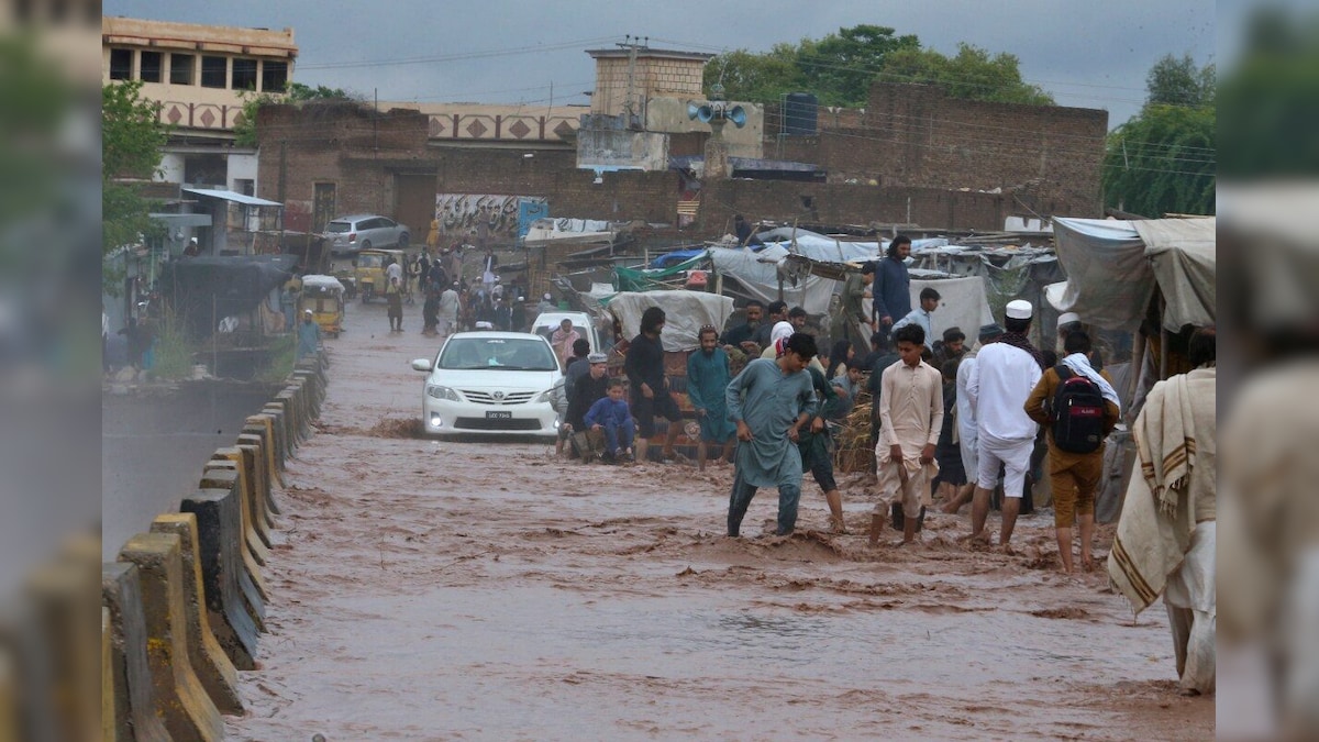 Rain deaths of boats swimming on the streets with macious destruction