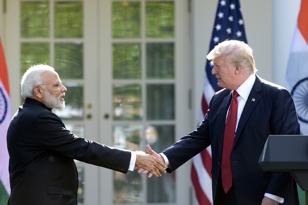 President Donald Trump and Indian Prime Minister Narendra Modi shake hands after making statements in the Rose Garden of the White House in Washington, Monday. Photo: AP President Donald Trump and Indian Prime Minister Narendra Modi shake hands after making statements in the Rose Garden of the White House in Washington, Monday. Photo: AP