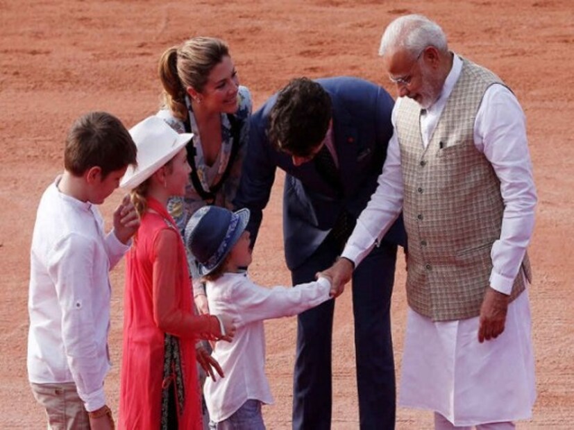 Prime Minister Narendra Modi greets his Canadian counterpart Justin Trudeau's son Hadrien during Trudeau's ceremonial reception in New Delhi. (Image: Reuters)