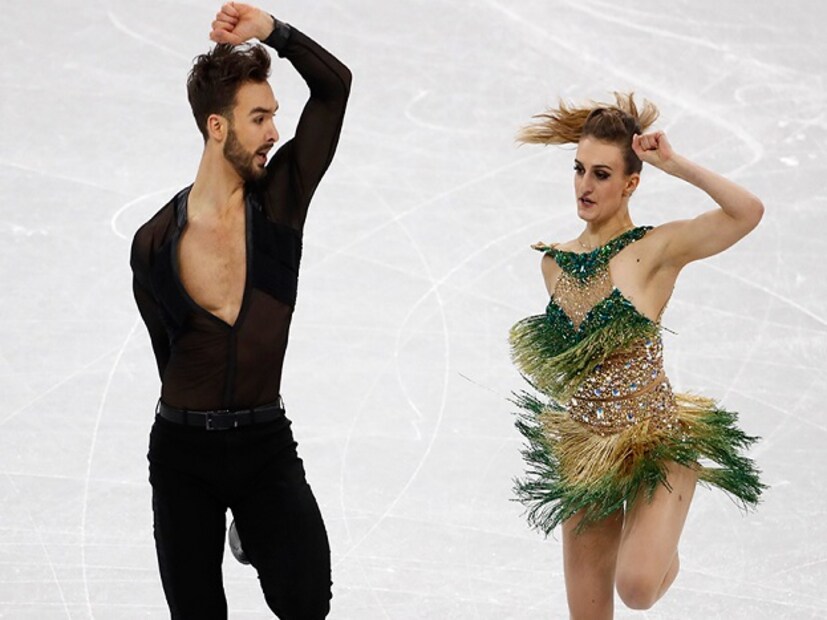 The French ice dancer's glittering emerald costume at the Olympics had come unhooked at the neckline and later in the routine her left breast was exposed live on television. (Image: Reuters)