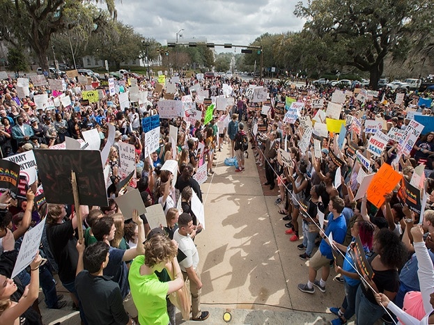 Students gather on the steps of the old Florida Capitol protesting gun violence in Tallahassee. (Image: AP) Students gather on the steps of the old Florida Capitol protesting gun violence in Tallahassee. (Image: AP)