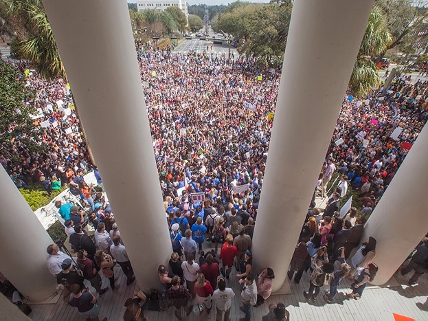 Protesters rally against gun violence on the steps of the old Florida Capitol in Tallahassee. (Image: AP) Protesters rally against gun violence on the steps of the old Florida Capitol in Tallahassee. (Image: AP)