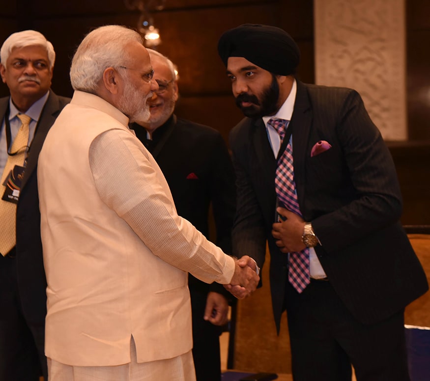 Airbnb India's Country Manager, Amanpreet Bajaj greets Prime Minister Narendra Modi at the summit (Photo: News18) Airbnb India's Country Manager, Amanpreet Bajaj greets Prime Minister Narendra Modi at the summit (Photo: News18)