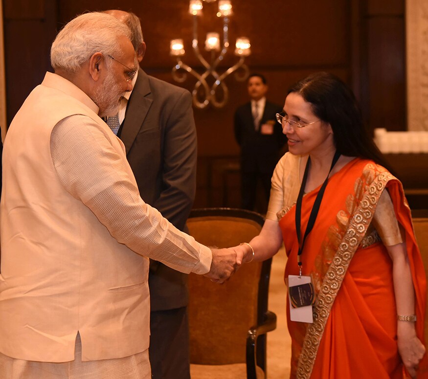CEO, Standard Chartered Bank, Zarin Daruwala shakes hands with PM Narendra Modi at the News18 Rising India Summit (Photo: News18) CEO, Standard Chartered Bank, Zarin Daruwala shakes hands with PM Narendra Modi at the News18 Rising India Summit (Photo: News18)