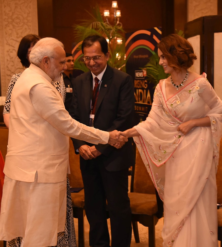 Bollywood actress Kangana Ranaut shakes hands with PM Narendra Modi at the summit (Photo: News18) Bollywood actress Kangana Ranaut shakes hands with PM Narendra Modi at the summit (Photo: News18)