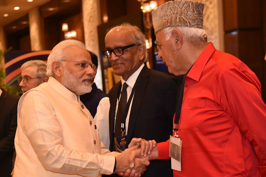 Politician Farooq Abdullah and PM Modi share some sweet nothings at News18 Rising India Summit (Photo: News18) Politician Farooq Abdullah and PM Modi share some sweet nothings at News18 Rising India Summit (Photo: News18)