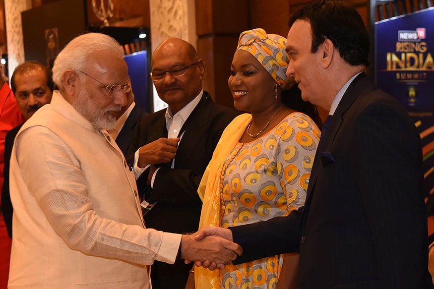 UAE Ambassador to India, Ahmed Al Banna and PM Narendra Modi exchange greetings at the News18 Rising India Summit (Photo: News18) UAE Ambassador to India, Ahmed Al Banna and PM Narendra Modi exchange greetings at the News18 Rising India Summit (Photo: News18)