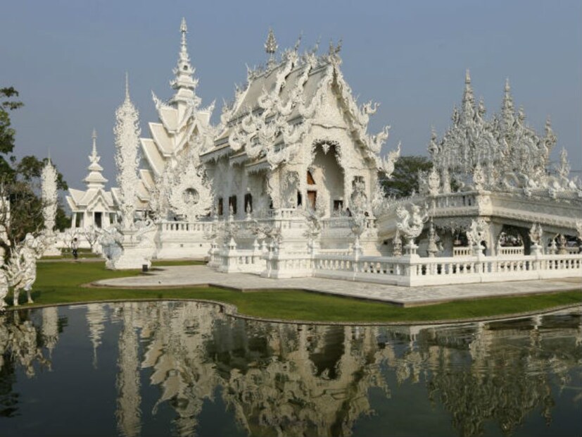 Thailand | Airfare: Rs 8,000 and above | Currency Rate: 1 Thai Baht = INR 2.8 | Things to do: Visit Chiang Mai Night Bazaar, safari world zoo, the white temple Wat Rong Khun, Bangkok floating markets and take a ferry ride to James Bond Island. (Photo: Reuters)