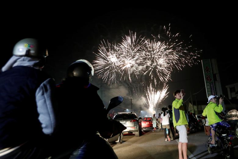 Fireworks light up the sky during the 'Beehive Firecrackers' festival at the Yanshui district in Tainan, Taiwan. (Image: REUTERS) Fireworks light up the sky during the 'Beehive Firecrackers' festival at the Yanshui district in Tainan, Taiwan. (Image: REUTERS)