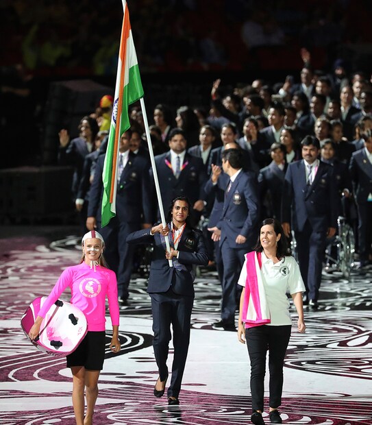 India's flag bearer PV Sindhu leads her team into Carrara Stadium for the opening ceremony for the 2018 Commonwealth Games on the Gold Coast, Australia. (Image: AP)