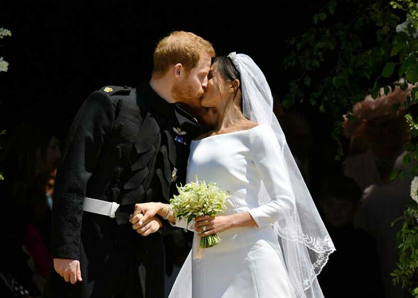 হ্যারি ও মেগান মর্কেলের ফার্স্ট কিস (Photo: Reuters)