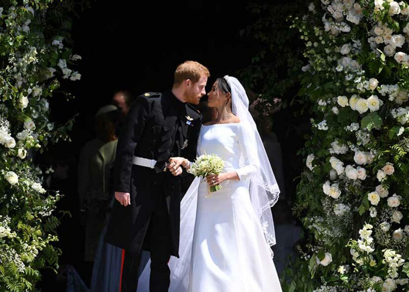 হ্যারি ও মেগান মর্কেলের ফার্স্ট কিস (Photo: Reuters)
