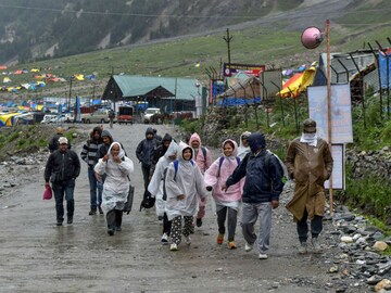 প্রবল বৃষ্টির জেরে স্থগিত অমরনাথ যাত্রা, দেখুন ছবি