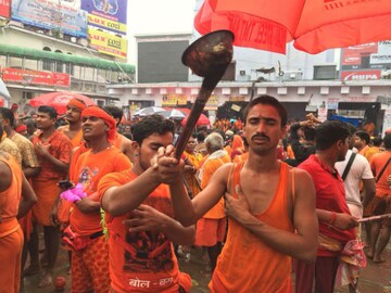 শ্রাবণের প্রথম সোমবারে বৈদ্যনাথ ধামে ভক্তদের ঢল, দেখুন ছবি শ্রাবণের প্রথম সোমবারে বৈদ্যনাথ ধামে ভক্তদের ঢল, দেখুন ছবি