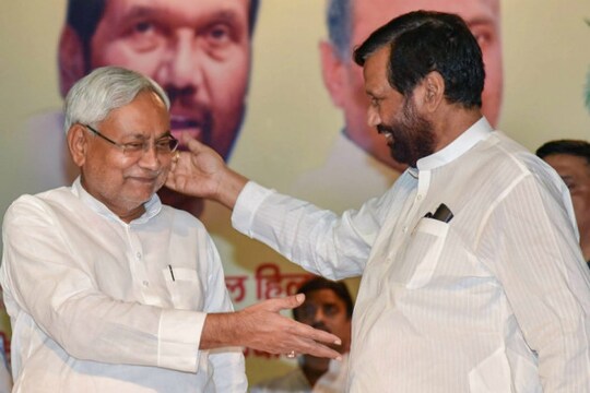 File photo of Bihar CM Nitish Kumar with LJP chief and Union Minister Ram Vilas Paswan. (PTI)