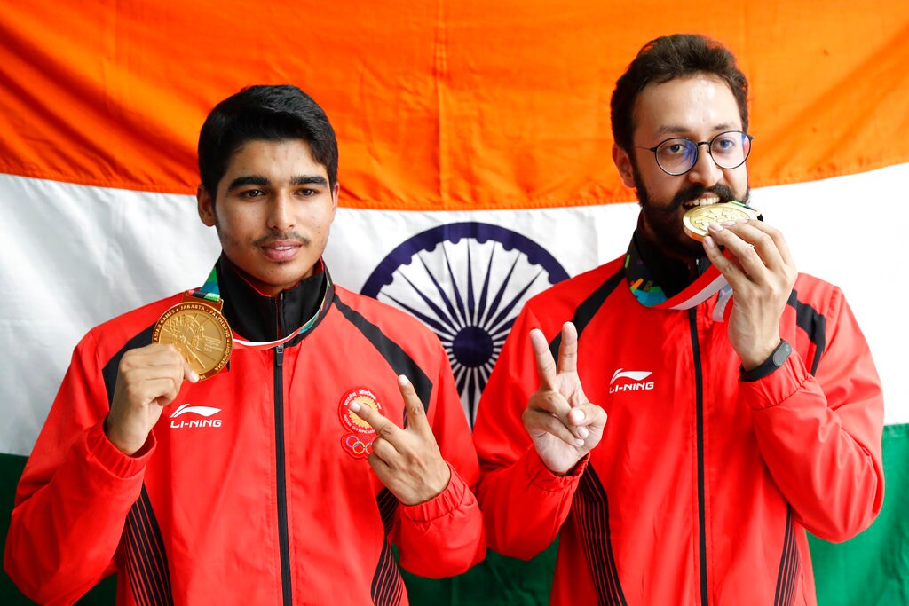 সৌরভ ও অভিষেক বর্মার এই পদক জেতাতেও তৈরি হয়েছে রেকর্ড ৷ একই বিভাগে এই প্রথম দুটি পদক এল ভারতের ঘরে ৷ (Image: AP) সৌরভ ও অভিষেক বর্মার এই পদক জেতাতেও তৈরি হয়েছে রেকর্ড ৷ একই বিভাগে এই প্রথম দুটি পদক এল ভারতের ঘরে ৷ (Image: AP)