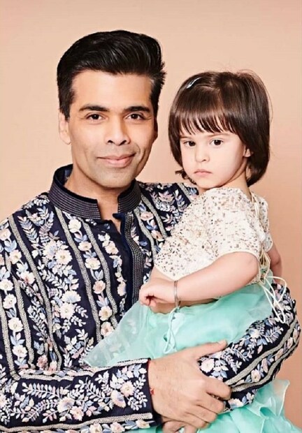 মেয়ে রুহি কে কোলে নিয়ে করণ (Photo: Instagram)