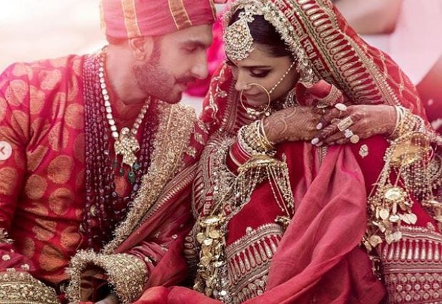 গোলাপি রঙে ভরে উঠল রণবীর-দীপিকার বিয়ের আসর৷ দু’জনের পোশাকেই গোলাপি রঙের ছোঁয়া ৷ কাছাকাছি, পাশাপাশি ৷ কানে কানে যেন সুখে থাকার কথাই বলে চলেছেন দীপবীর ৷ Photo: Instagram গোলাপি রঙে ভরে উঠল রণবীর-দীপিকার বিয়ের আসর৷ দু’জনের পোশাকেই গোলাপি রঙের ছোঁয়া ৷ কাছাকাছি, পাশাপাশি ৷ কানে কানে যেন সুখে থাকার কথাই বলে চলেছেন দীপবীর ৷ Photo: Instagram