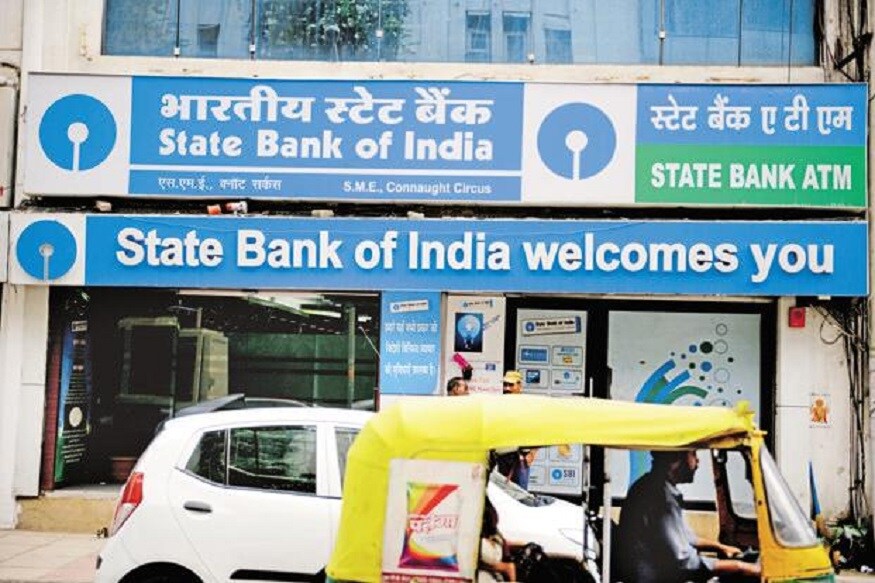 কাউকে টাকা পাঠাতে হবে ? SBI -এর এটিএমে অন্য যে কোনও SBI -এর অ্যাকাউন্টে শুল্ক ছাড়াই টাকা পাঠাতে পারবেন ৷ কাউকে টাকা পাঠাতে হবে ? SBI -এর এটিএমে অন্য যে কোনও SBI -এর অ্যাকাউন্টে শুল্ক ছাড়াই টাকা পাঠাতে পারবেন ৷