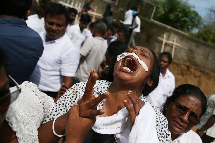 আজ শ্রীলঙ্কা সরকার জাতীয় শোক দিবস ঘোষণা করেছে। সব সরকারি প্রতিষ্ঠানে আজ দেশটির জাতীয় পতাকা অর্ধনমিত রাখা হয়। (Image: Reuters) আজ শ্রীলঙ্কা সরকার জাতীয় শোক দিবস ঘোষণা করেছে। সব সরকারি প্রতিষ্ঠানে আজ দেশটির জাতীয় পতাকা অর্ধনমিত রাখা হয়। (Image: Reuters)