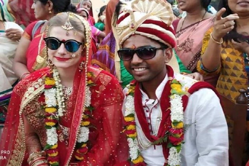 গ্রামবাসীরা বেশ খুশি হয়েছেন ৷ রিঙ্কুর বিয়ে হয়েছে বিদেশিনির সঙ্গে ৷ বিয়ের ফলেই শিরোনাম এসেছেন তিনি ৷ গ্রামবাসীরা বেশ খুশি হয়েছেন ৷ রিঙ্কুর বিয়ে হয়েছে বিদেশিনির সঙ্গে ৷ বিয়ের ফলেই শিরোনাম এসেছেন তিনি ৷