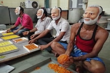 একজিট পোলের ইঙ্গিতে এনডিএ শিবিরে খুশির জোয়ার, নরেন্দ্র মোদির মুখোশে মিষ্টি একজিট পোলের ইঙ্গিতে এনডিএ শিবিরে খুশির জোয়ার, নরেন্দ্র মোদির মুখোশে মিষ্টি