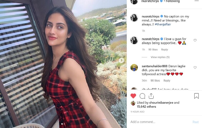 ♦ লাল-কালো চেকওয়ালা পোশাকে সেজেছেন নুসরত ৷ সেই ছবি নিজের ইনস্টাগ্রাম হ্যান্ডেলে শেয়ার করে লিখলেন,‘‘আমার মনে এখন কোনও ক্যাপশন আসছে না ৷ সব সময়ের মতো এখনও আপনাদের আশীর্বাদ চাই।’’ছবি: ইনস্টাগ্রাম ৷