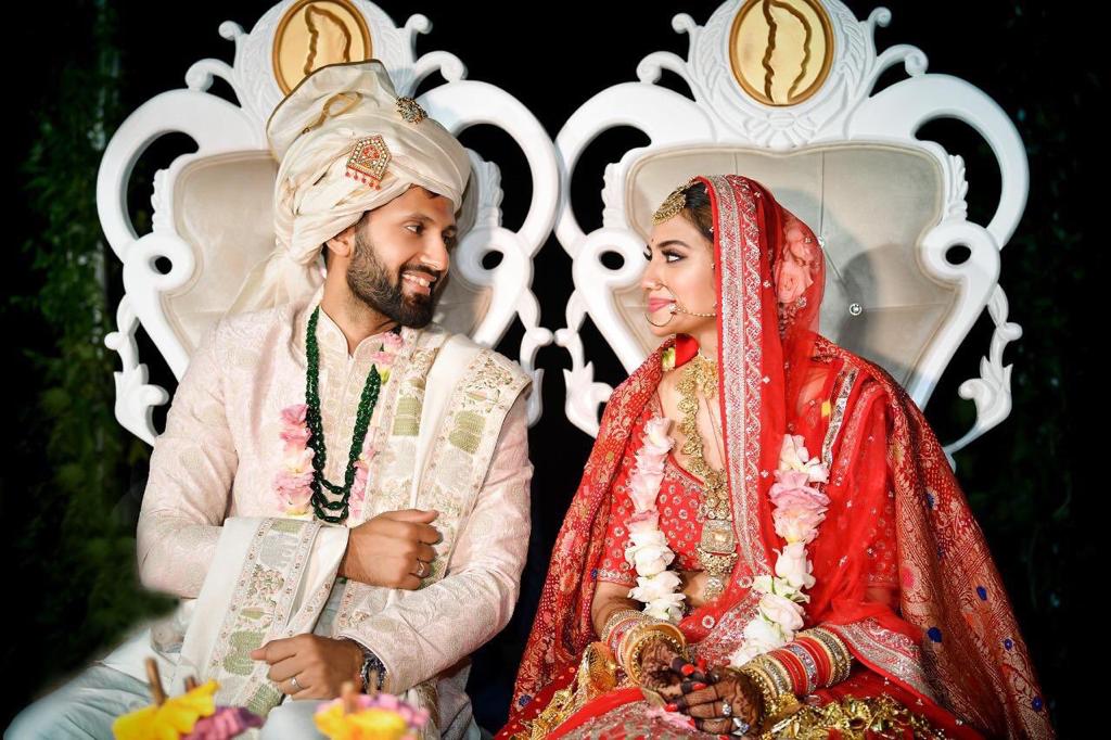 • জানা গিয়েছে, নুসরতের বিয়ের ওই লেহেঙ্গা ডিজাইন করে দিয়েছেন খোদ স্বামী নিখিল ৷ আর নিখিলের আইভরি রঙা শেরওয়ানি ডিজাইন করেছেন রোহিত বাল ৷ • জানা গিয়েছে, নুসরতের বিয়ের ওই লেহেঙ্গা ডিজাইন করে দিয়েছেন খোদ স্বামী নিখিল ৷ আর নিখিলের আইভরি রঙা শেরওয়ানি ডিজাইন করেছেন রোহিত বাল ৷