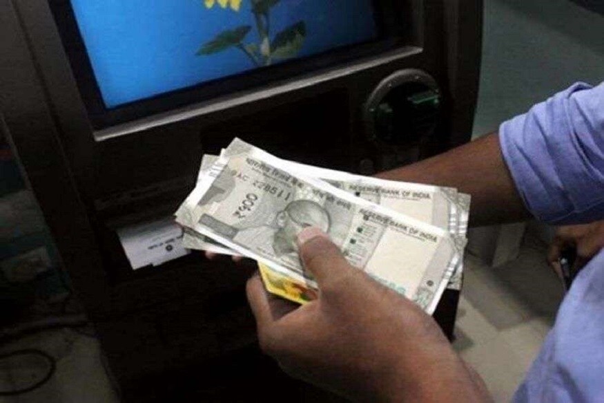 ATM মেশিন নিয়ে কমবেশি হয়রানি সবাইকে পোহাতে হয়। হামেশাই মেশিনের গায়ে ঝুলতে দেখা যায় NO CASH বোর্ড। ATM নিয়ে আরও নানা সমস্যায় নাজেহাল হতে হয় মানুষজনকে। এবার সেইসমস্ত সমস্যার মোকাবিলা করতে নয়া পদক্ষেপ RBI-র --Representative imagePhoto Source: Collected ATM মেশিন নিয়ে কমবেশি হয়রানি সবাইকে পোহাতে হয়। হামেশাই মেশিনের গায়ে ঝুলতে দেখা যায় NO CASH বোর্ড। ATM নিয়ে আরও নানা সমস্যায় নাজেহাল হতে হয় মানুষজনকে। এবার সেইসমস্ত সমস্যার মোকাবিলা করতে নয়া পদক্ষেপ RBI-র --Representative imagePhoto Source: Collected