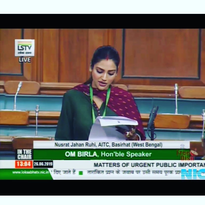 • ঘটা করে বিয়ে সেরে কলকাতায় ফিরেই অবশ্য নিজের কাজে ব্যস্ত হয়ে পড়েছিলেন সদ্য নির্বাচিত তারকা সাংসদ নুসরত ৷ দিল্লিতে গিয়ে শপথ নিয়েছন ৷ পাশপাশি নিজের কেন্দ্রের বিভিন্ন প্রশাসনিক কাজেও ব্যস্ত ছিলেন নুসরত ৷ ছবি: ইনস্টাগ্রাম ৷ • ঘটা করে বিয়ে সেরে কলকাতায় ফিরেই অবশ্য নিজের কাজে ব্যস্ত হয়ে পড়েছিলেন সদ্য নির্বাচিত তারকা সাংসদ নুসরত ৷ দিল্লিতে গিয়ে শপথ নিয়েছন ৷ পাশপাশি নিজের কেন্দ্রের বিভিন্ন প্রশাসনিক কাজেও ব্যস্ত ছিলেন নুসরত ৷ ছবি: ইনস্টাগ্রাম ৷